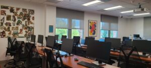 rear view of room showing dark computer screens