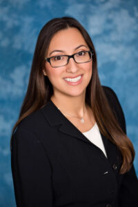 Woman smiling wearing glasses