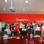 Group of students in Triumph