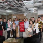 groupshot of students in office