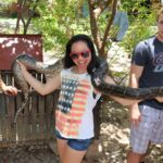 student with snake