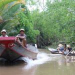 student on boat in another country