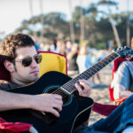 cool dood playing guitar