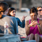 students at beach party
