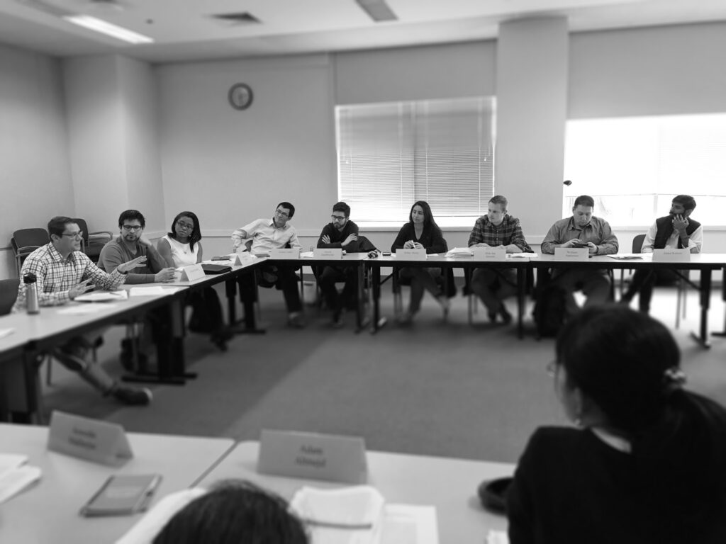 Student discussing experimental economics