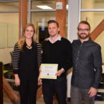 Students receiving award at Leatherby Center