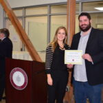 Students receiving award at Leatherby Center