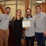 Students receiving award at Leatherby Center