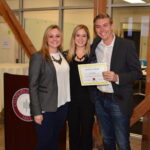 Students receiving award at Leatherby Center