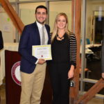 Students receiving award at Leatherby Center