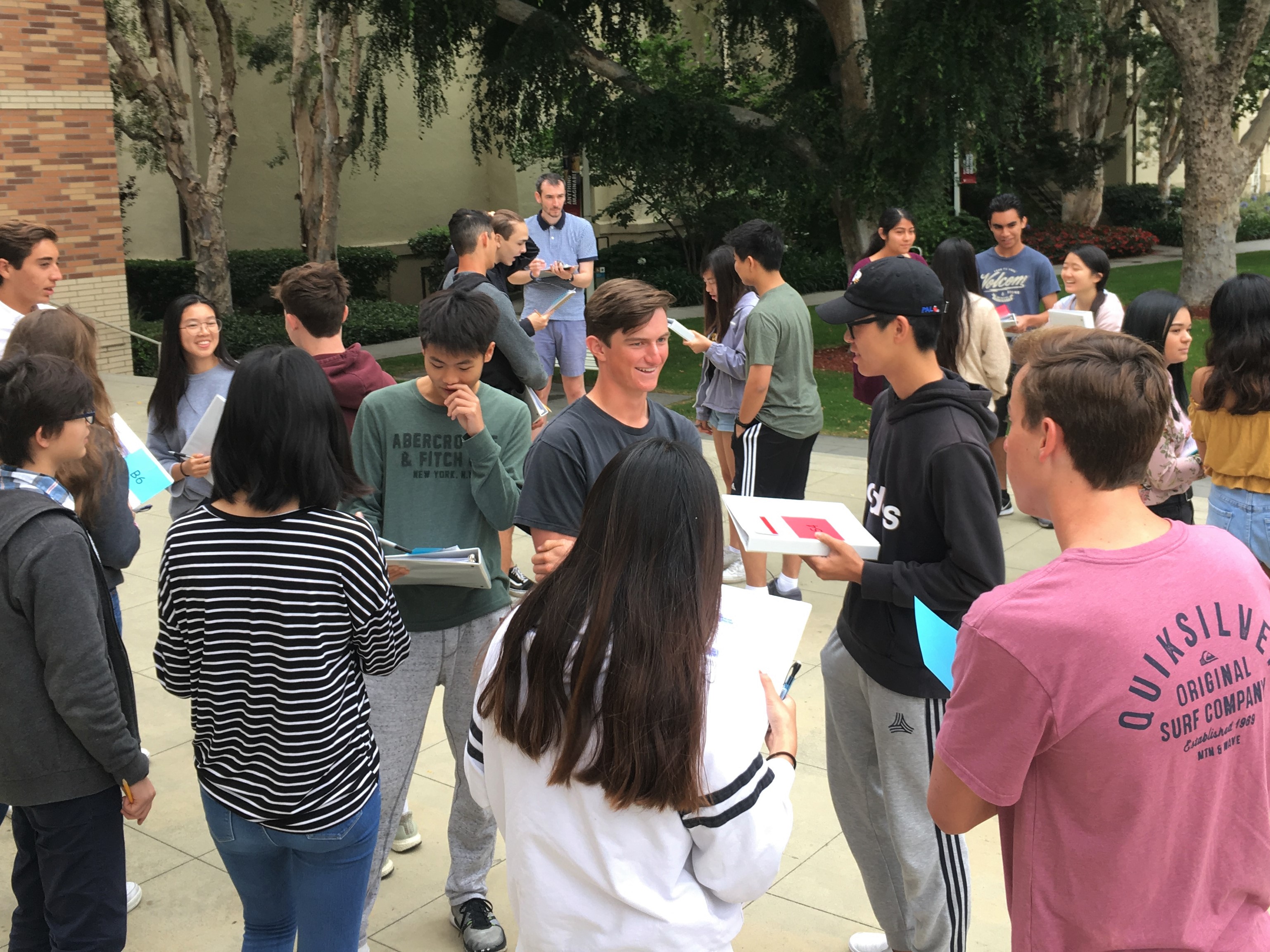 Students outside working together