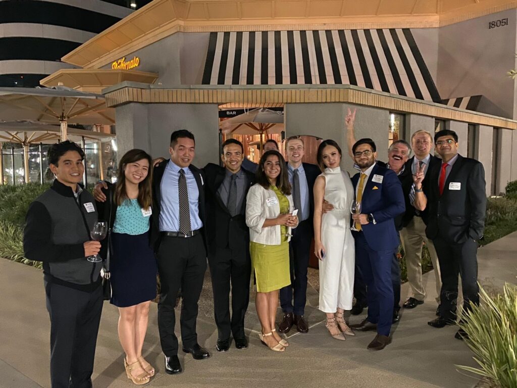 MBA Students and mentors posed outside of restaurant