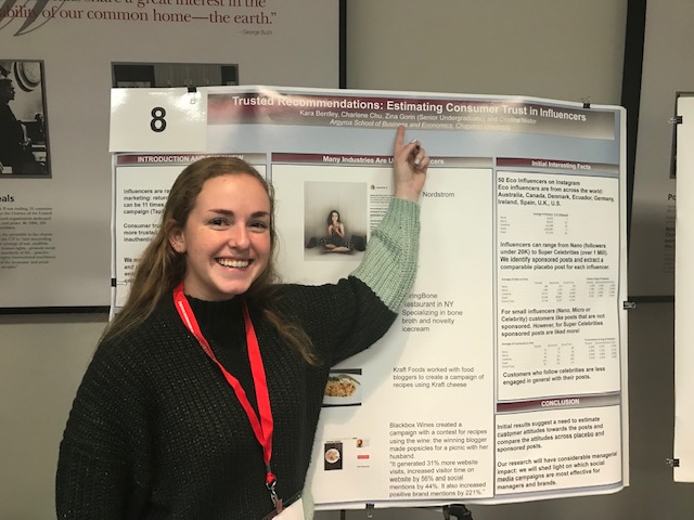 Zina Gorin in front of her research poster