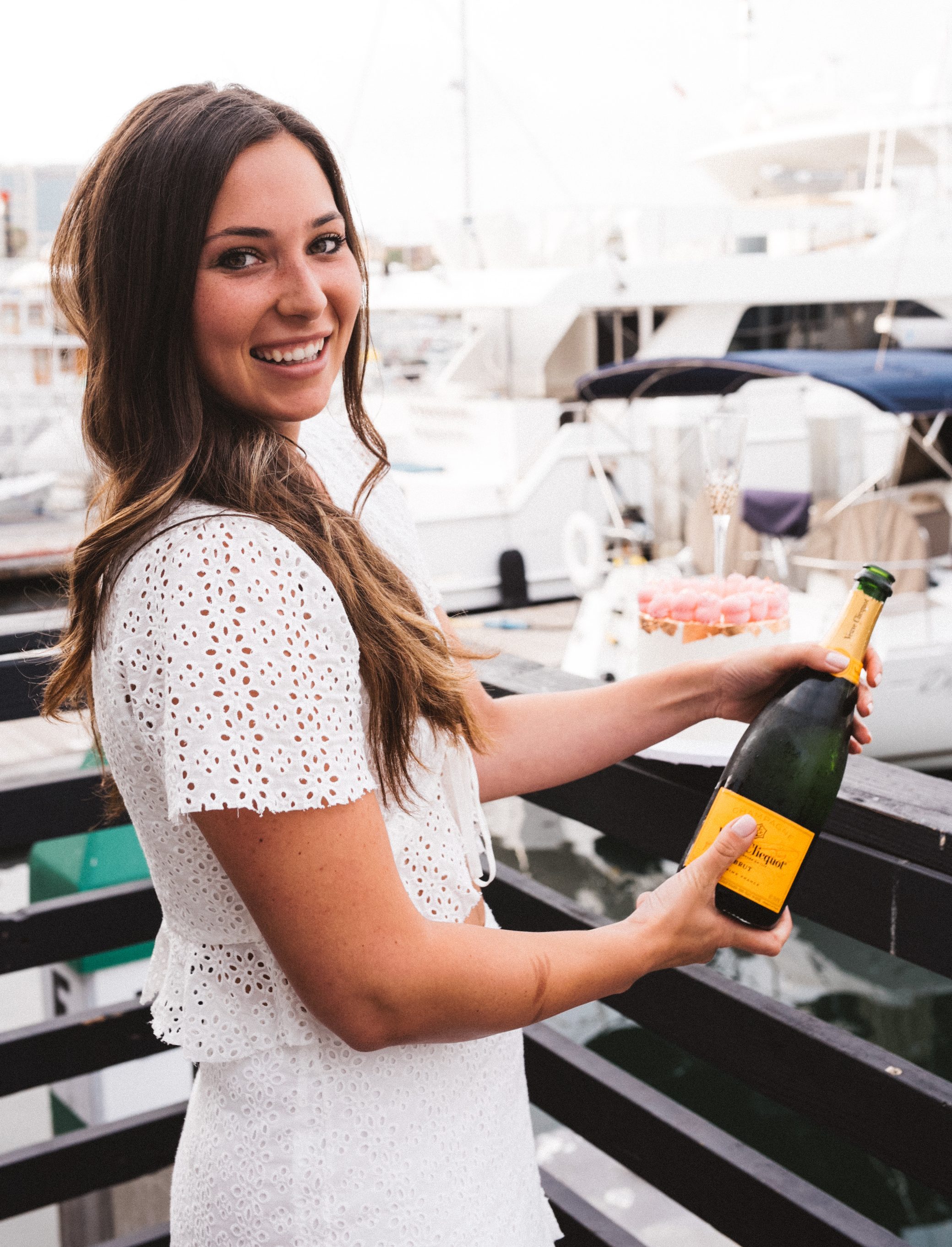 Nicci Julian with champagne bottle