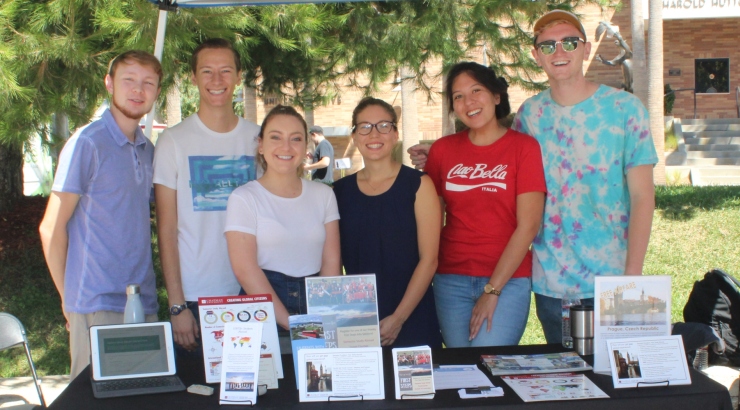 Students at fair table