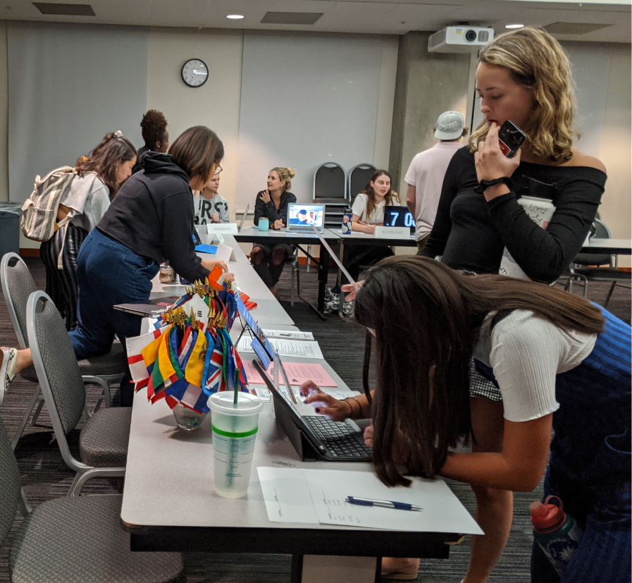 Student signing into Around the Globe event