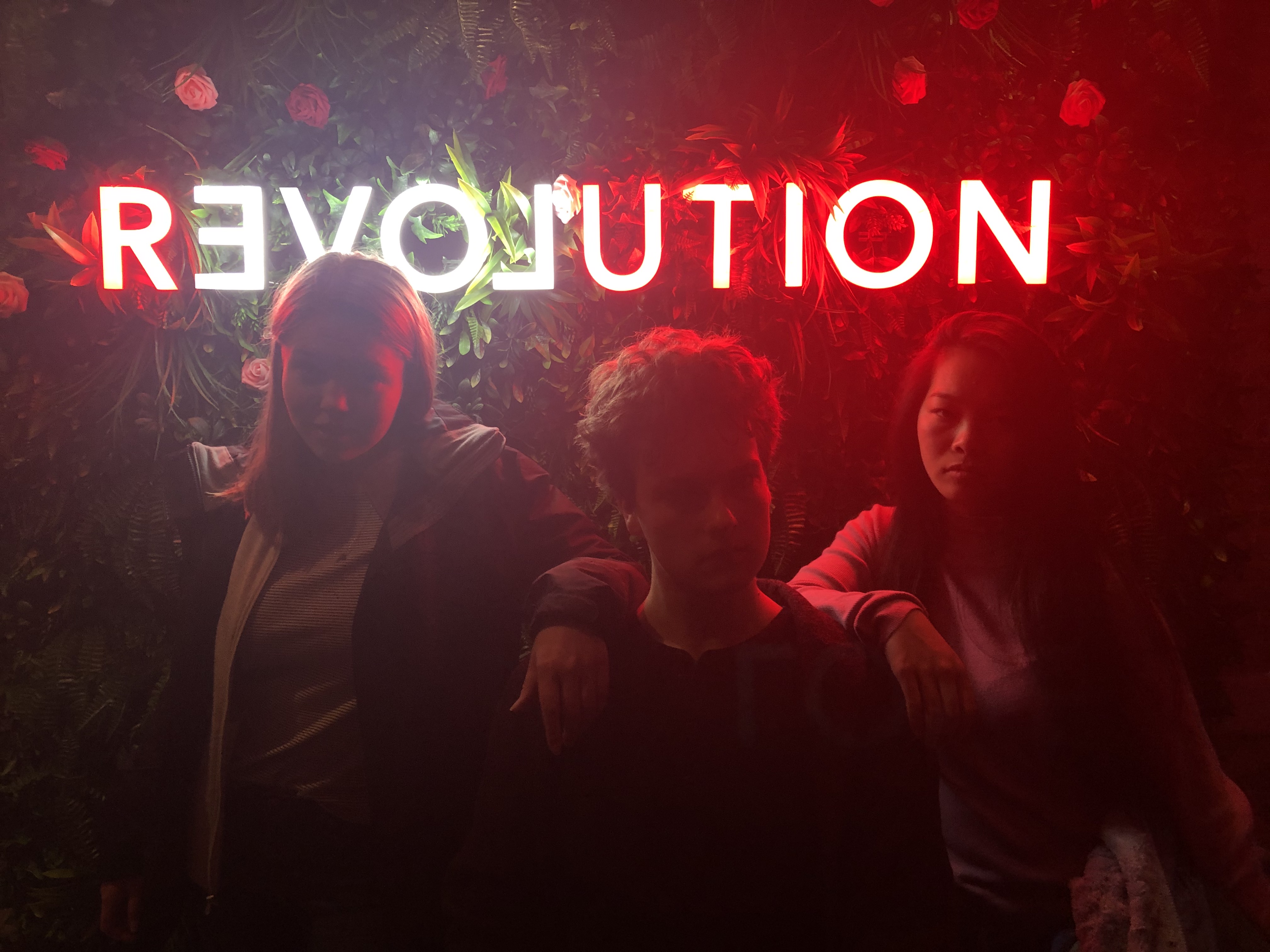 Students in front of Revolution sign