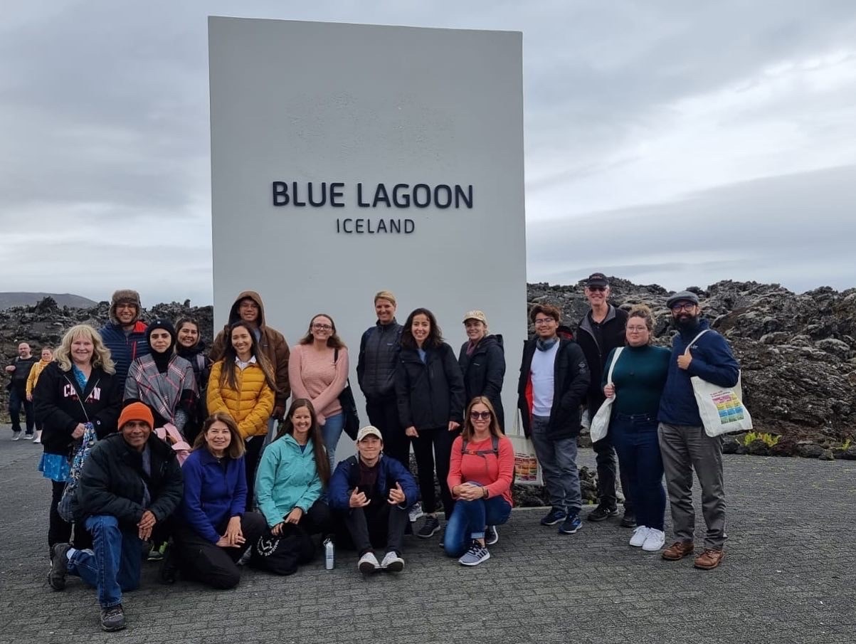 Students in front of Blue Lagoon Iceland sign