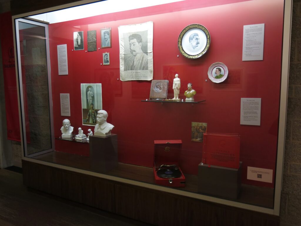 pieces of artwork in display case