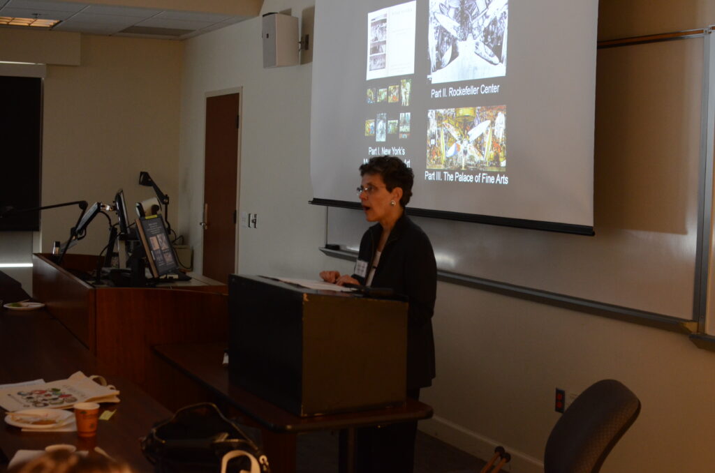 teacher in front of a screen