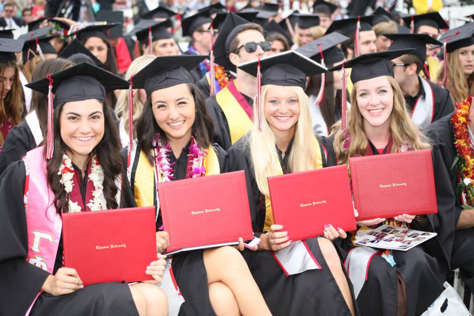 four women at graduation