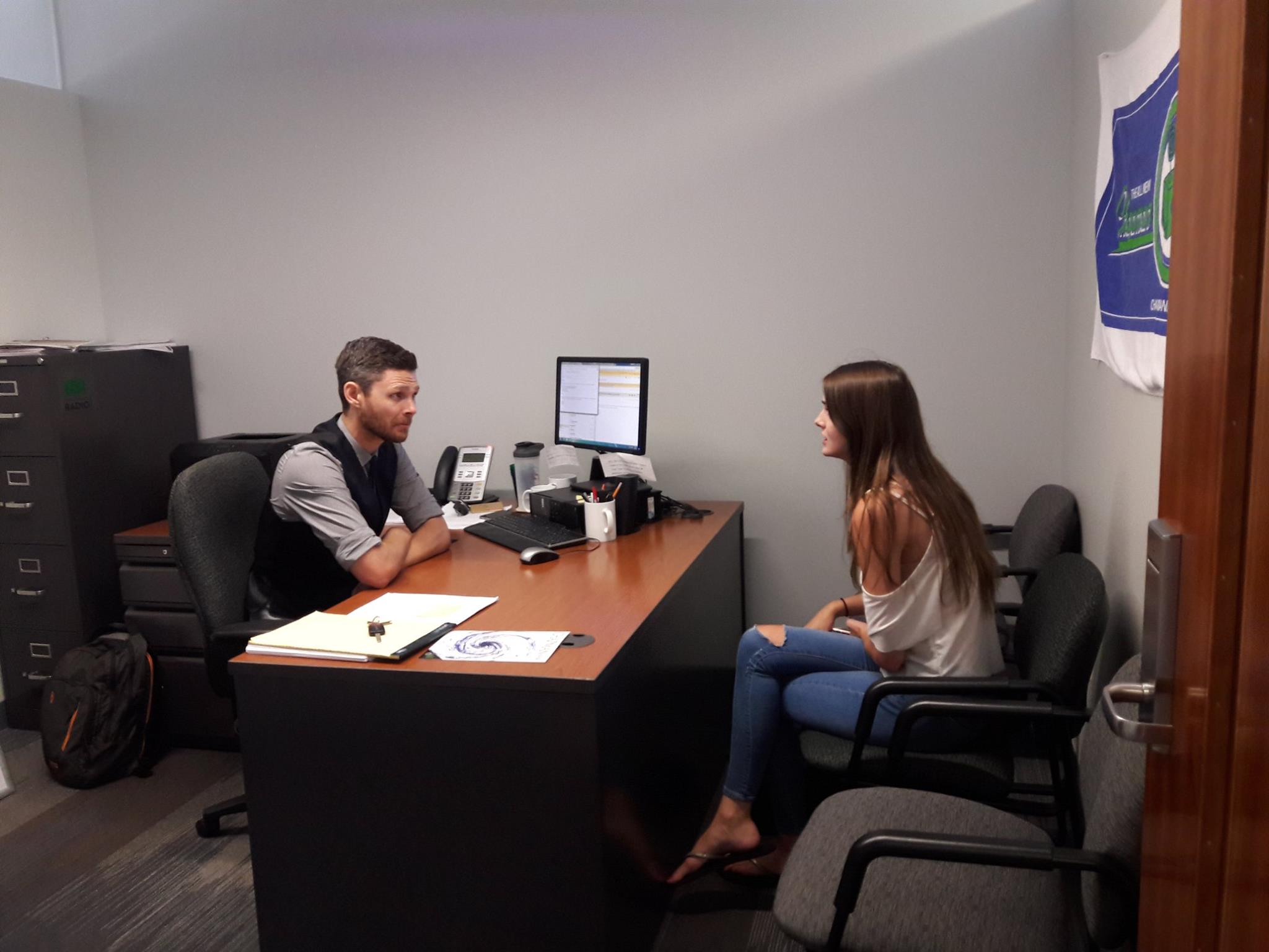 Advisor and student meeting in office