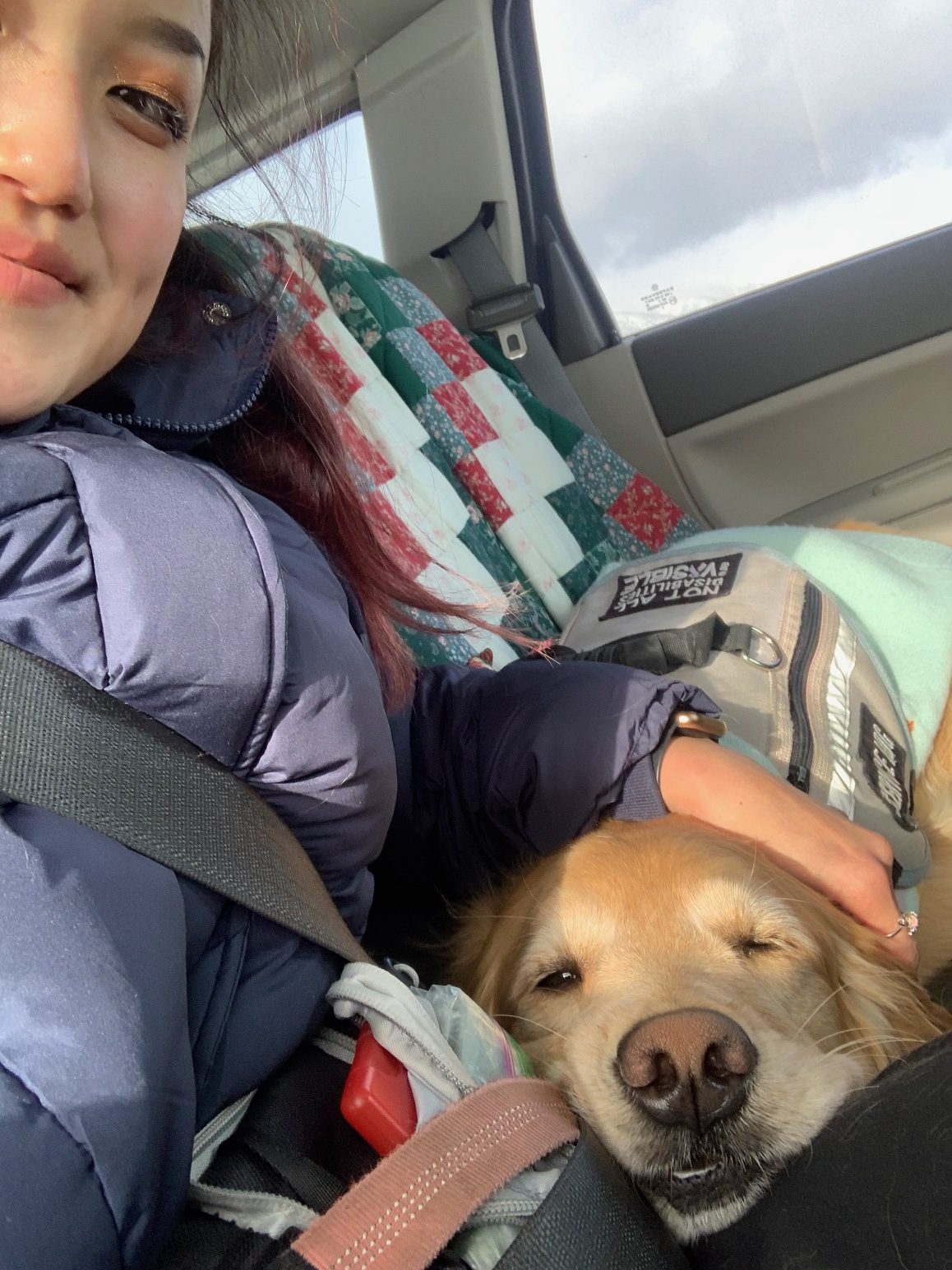 Kristin and Mailie snuggling in car