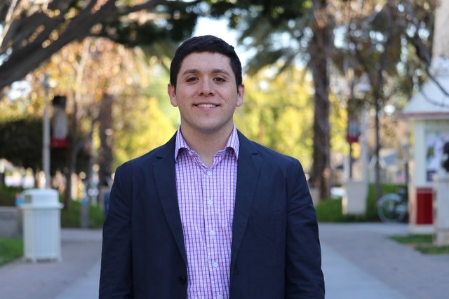 Vidal Arroyo smiling on campus