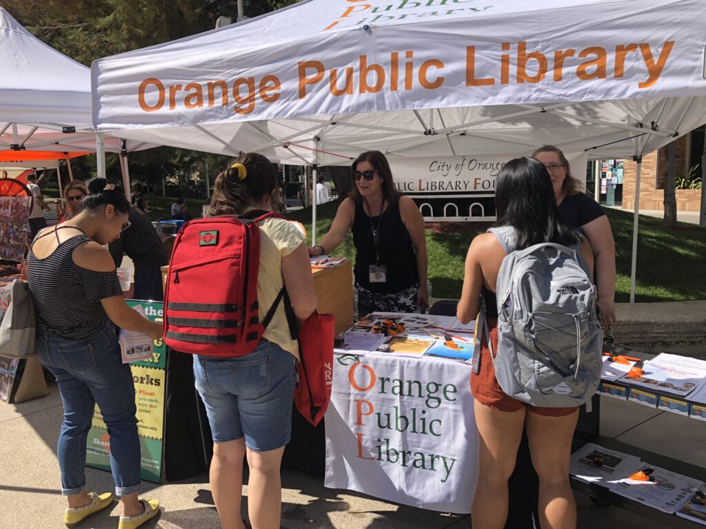 Orange Public Library Foundaiton helps at Merchant's Day