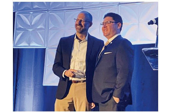 Andrew Lyon receives award