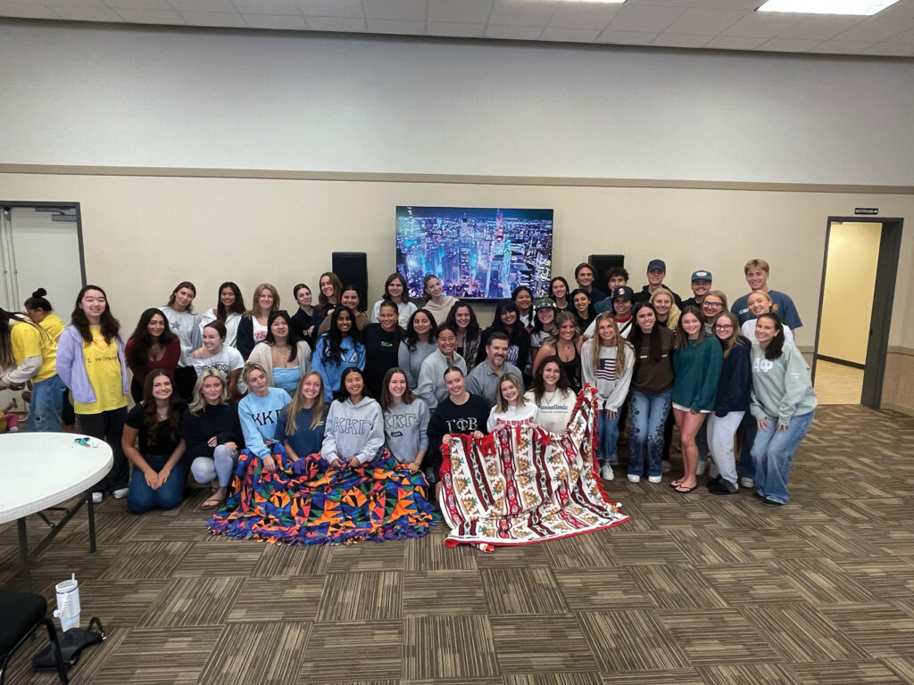Students representing Chapman’s Panhellenic organization made over 80 blankets for Marines stationed overseas on Love Orange City-Wide Volunteer Day.