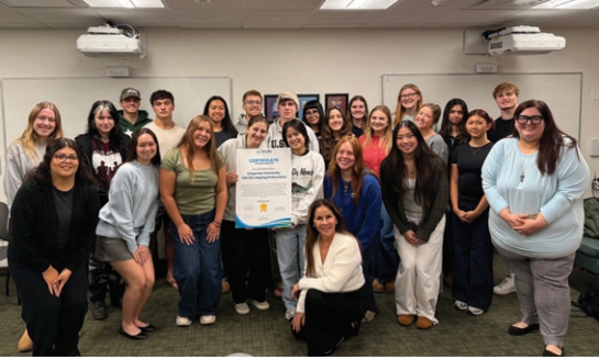 Students in CES 103 – Helping Professions withFriendly Center staff after their final presentation
