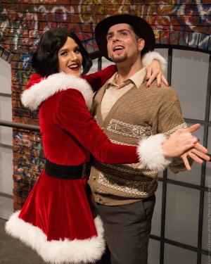 Two actors performing a scene from "Rent."