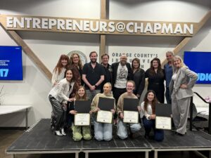 Karli and the other students with mentors at the incubator program