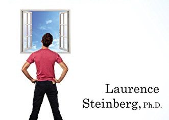 Laurence Steinberg posing in front of a window