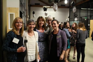 Dean Janeen Hill, as well as several faculty and students, pose at the Senior Awards.