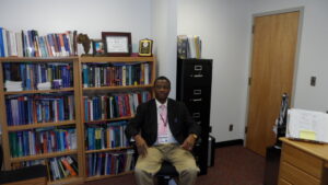 Dr. Emmanuel John in his office.
