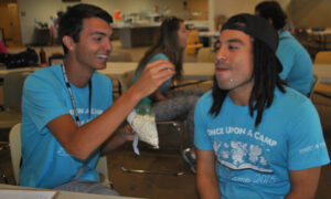 Rise Above Disabilities (RAD) Camp attendees take a lunch break.