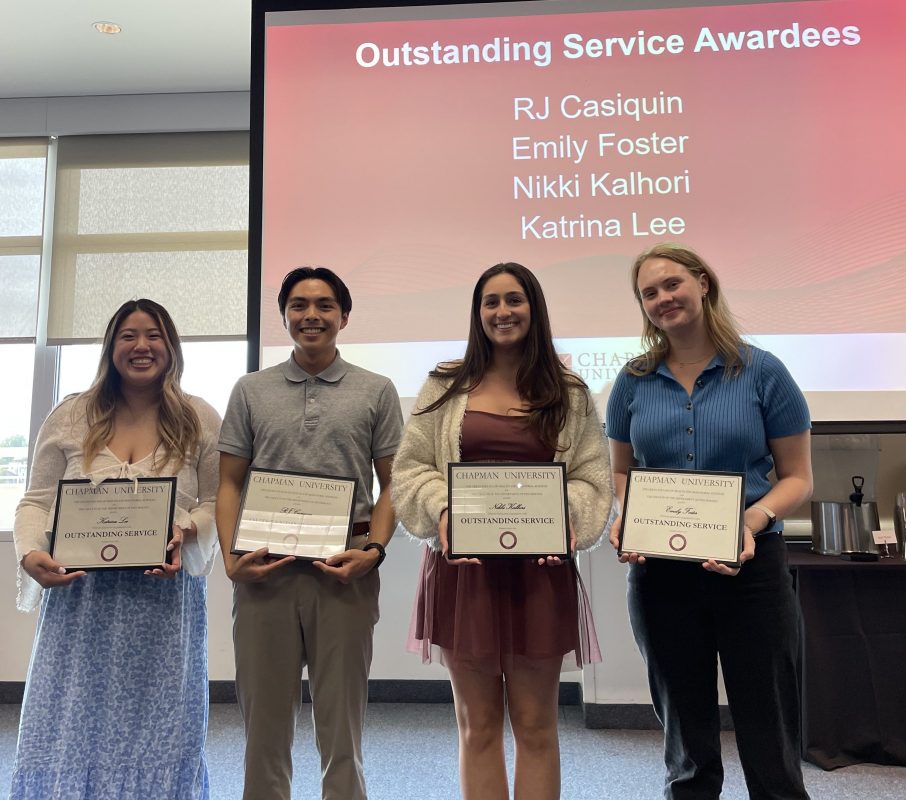 Students holding awards
