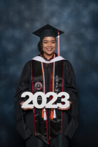 Loura-Derro-in-Grad-Cap-Gown