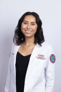 Gabrielle Guevara in a Lab Coat
