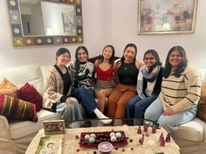 Emi with Friends on a couch
