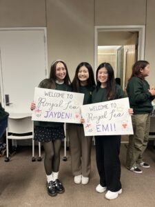 Emi with Friends and signs