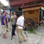 On the set of "The Red Envelope" in Hengdian Studios, China