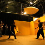 students learning how to sword fight safely as part of interterm stunts class at Dodge College