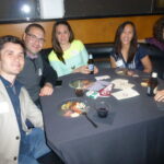Dodge College alums pose for a photo at an alumni mixer