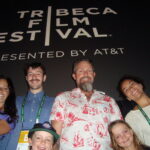 The Pink Helmet Posse filmmakers pose with documentary subjects at the Tribeca Film Festival in 2014