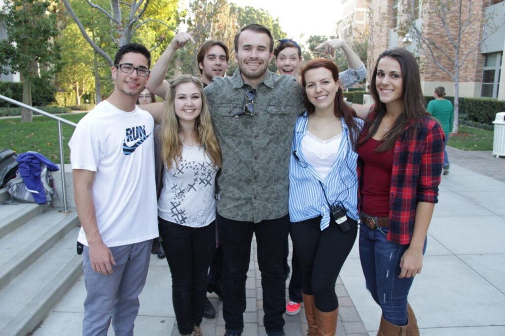 Dodge student Jacob Moncrief (center) and his production team on "Perceptors"