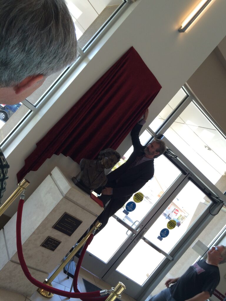 Cory O'Connor revealing the Marion Knott Memorial plaque