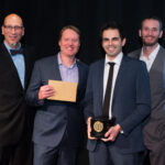Daniel Drummond (right center), winner of the gold medal in the alternative film category for “Chiaroscuro,” with Oscar®-winners Roy Conli (left), Don Hall (left center) and Chris Williams during the 42nd Annual Student Academy Awards® on Thursday, September 17, in Beverly Hills.